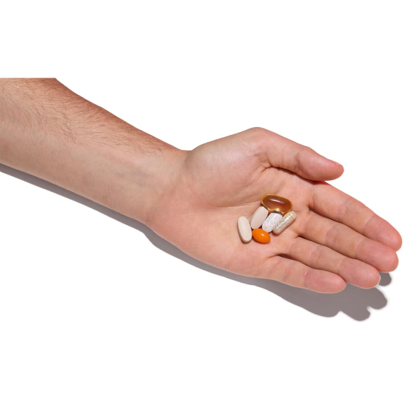 4.219733 gnc mega men 50 plus vitapak ebc hand.png