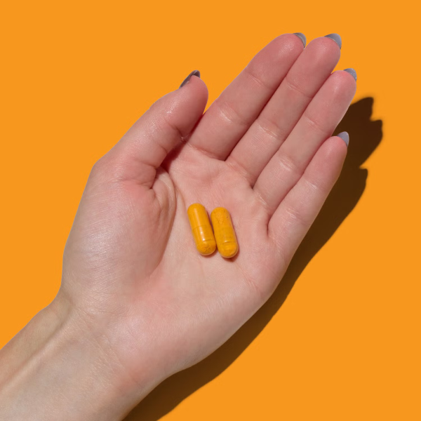 4.306031 gnc triflex turmeric formula fast acting ebc hand.png