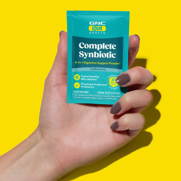 424748 gnc gut health complete synbiotic unflavored ebc hand.png
